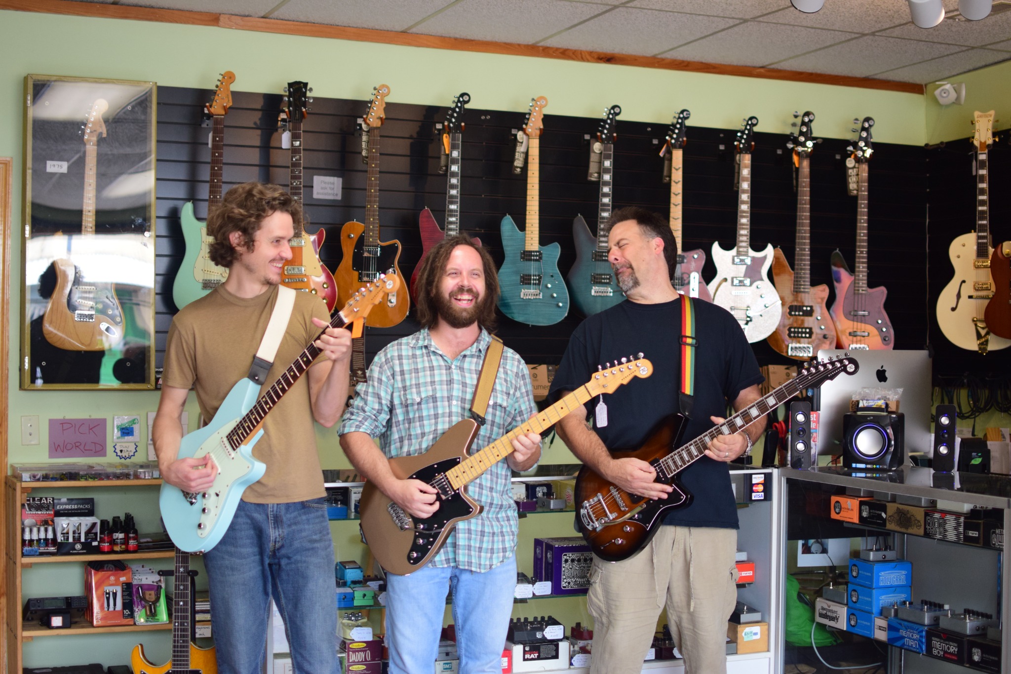 A candid moment with guitars in the shop